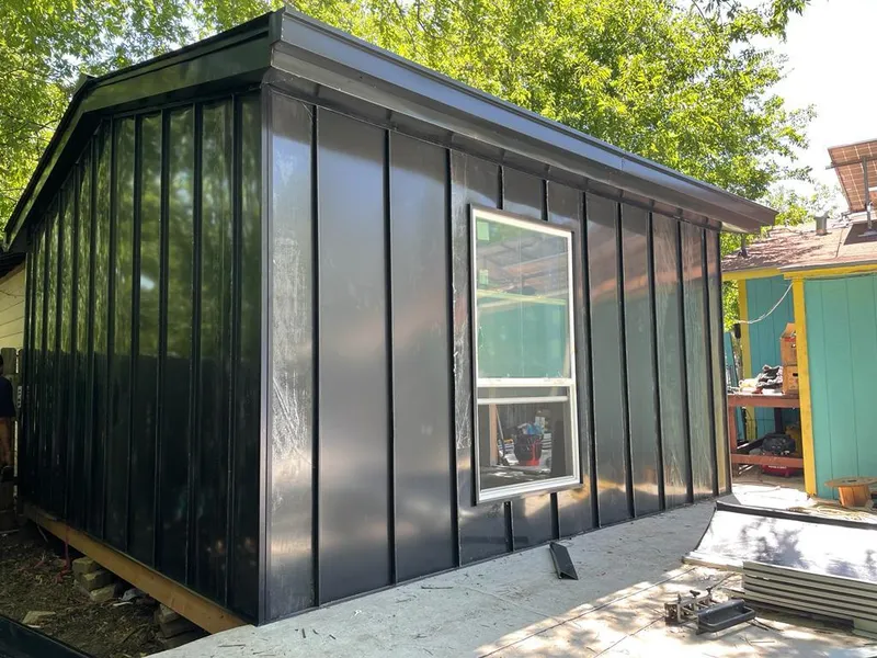 Black standing seam metal wall panels for Metal Roof Installation in Elba