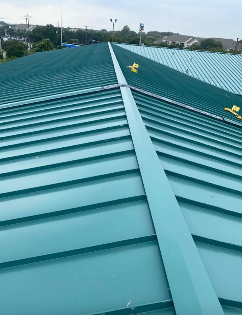 Green commercial metal roof ridge and valley for Metal Roof Repair in Elba